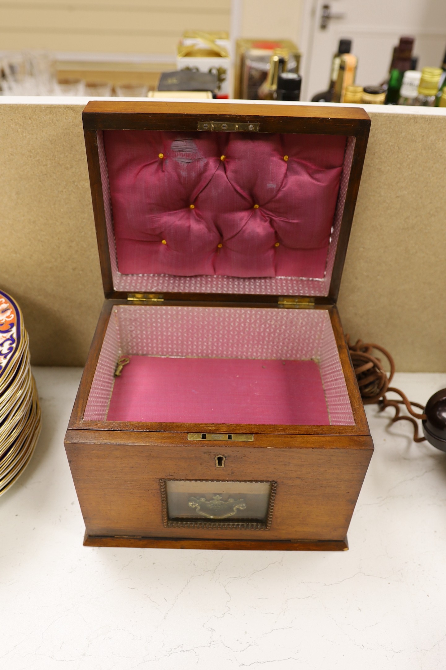 A brass bound rosewood humidor together with a walnut sewing box